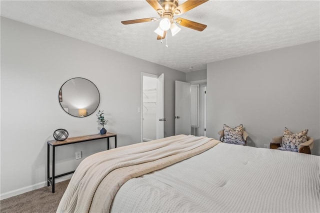 3833 Paddington Trl, Rex, GA 30273 - carpeted bedroom featuring a textured ceiling and ceiling fan