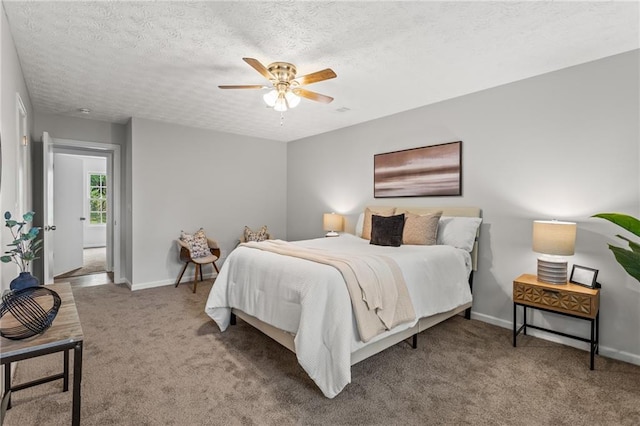 3833 Paddington Trl, Rex, GA 30273 - bedroom featuring carpet floors, a textured ceiling, and a ceiling fan