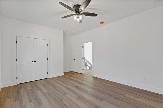 6371 Falcon Ln, Gainesville, GA 30506 - bathroom with wood finished floors, shower / bath combination with glass door, toilet, and vanity