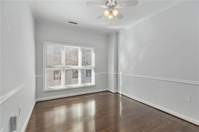 unfurnished room featuring crown molding, dark hardwood / wood-style floors, and ceiling fan