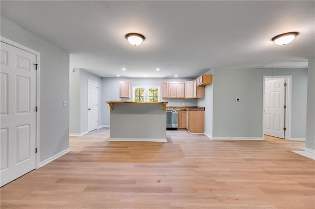 kitchen featuring light wood finished floors, recessed lighting, baseboards, stainless steel dishwasher, and open floor plan