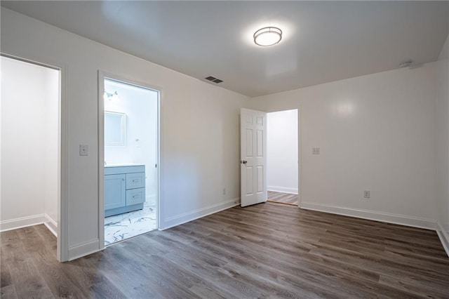 unfurnished room featuring dark hardwood / wood-style floors