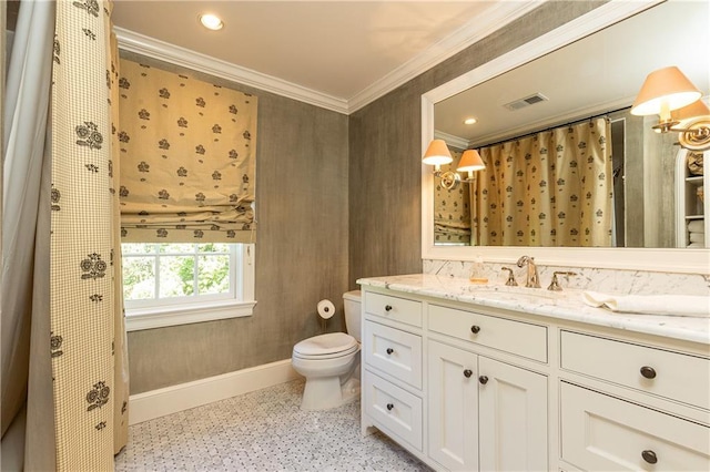 bathroom featuring visible vents, crown molding, baseboards, toilet, and vanity