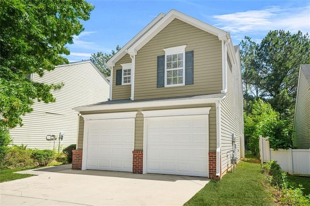 3454 Carriage Chase Rd, Atlanta, GA 30349 - view of front facade featuring driveway, an attached garage, and brick siding