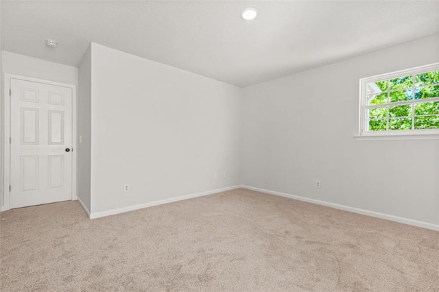 3454 Carriage Chase Rd, Atlanta, GA 30349 - carpeted spare room with baseboards and a smoke detector