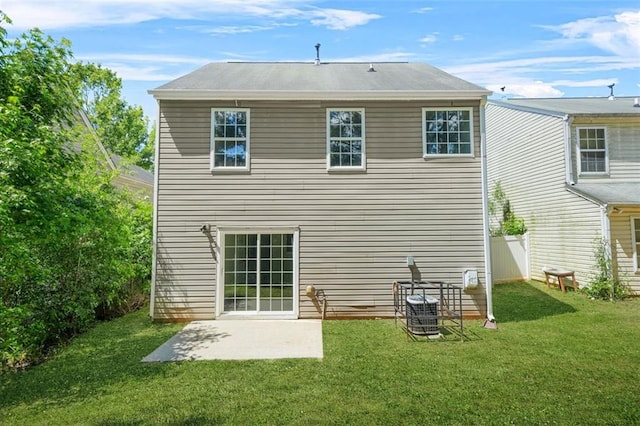 3454 Carriage Chase Rd, Atlanta, GA 30349 - rear view of property featuring a yard, a patio, and central AC