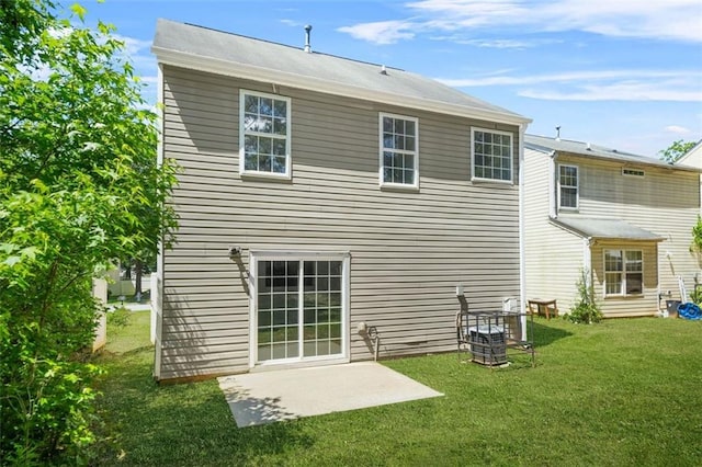 3454 Carriage Chase Rd, Atlanta, GA 30349 - back of house with a lawn and a patio