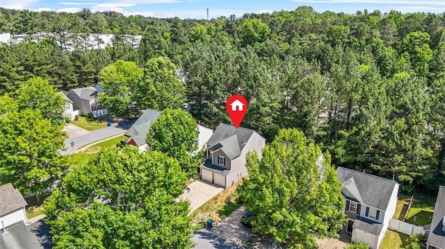3454 Carriage Chase Rd, Atlanta, GA 30349 - aerial view of residential area with a forest