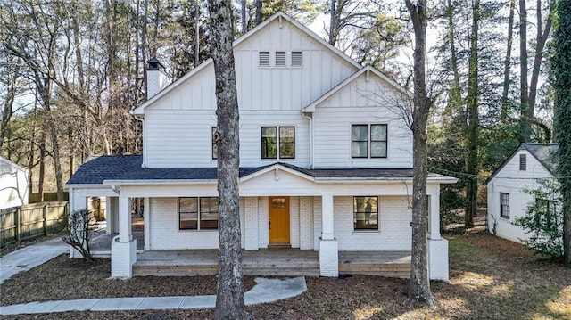 modern inspired farmhouse featuring a porch