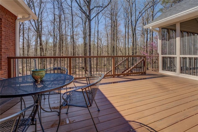 deck with outdoor dining space