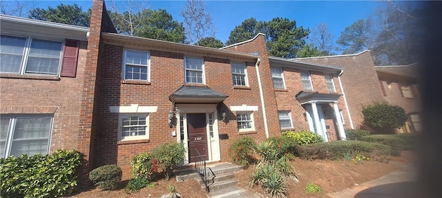 multi unit property featuring brick siding