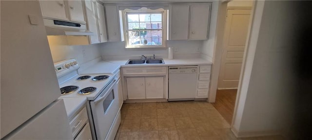 kitchen featuring light countertops, white appliances, a sink, and under cabinet range hood