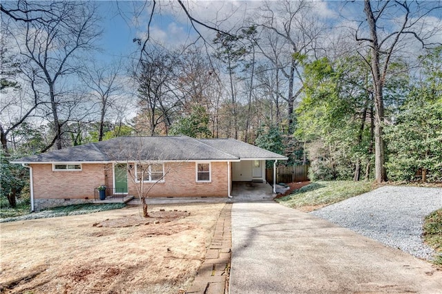 ranch-style house with a carport