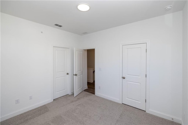 362 Olmstead Way Unit 23, Alpharetta, GA 30022 - unfurnished bedroom with baseboards and carpet flooring