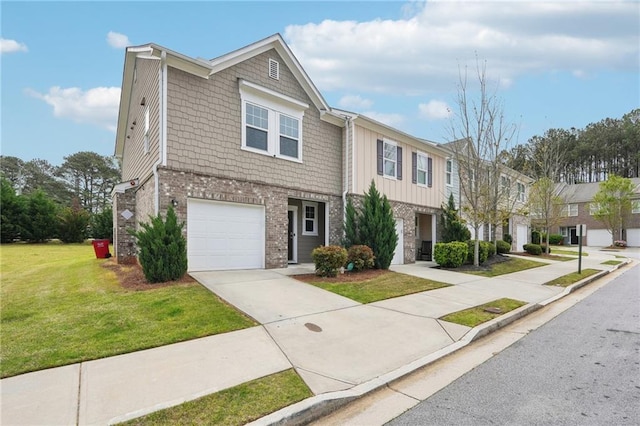 2051 Wildflower Way, Conyers, GA 30012 - view of property with a front lawn, brick siding, driveway, and a garage