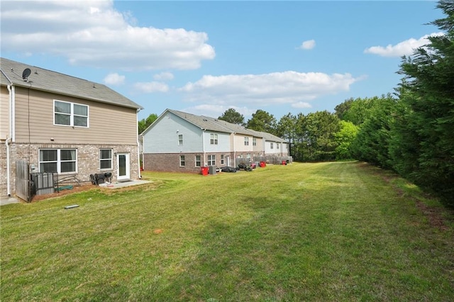 2051 Wildflower Way, Conyers, GA 30012 - exterior space featuring a lawn