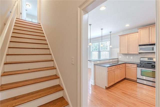 3404 Orchard St, Hapeville, GA 30354 - stairway with wood finished floors and recessed lighting
