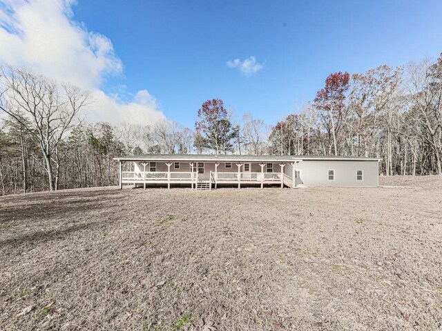 view of front facade featuring a wooden deck