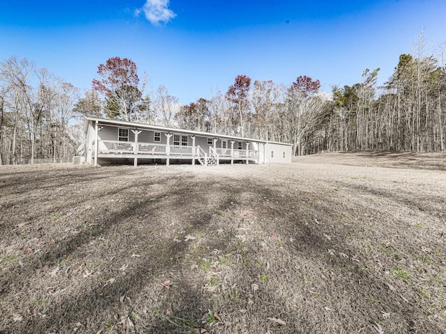 view of front of property featuring a deck