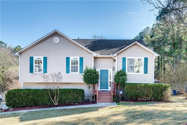 split foyer home with a front yard