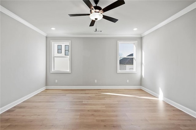 unfurnished room featuring light hardwood / wood-style floors, crown molding, and ceiling fan