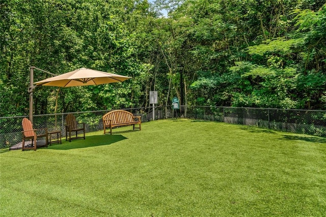 view of yard with fence