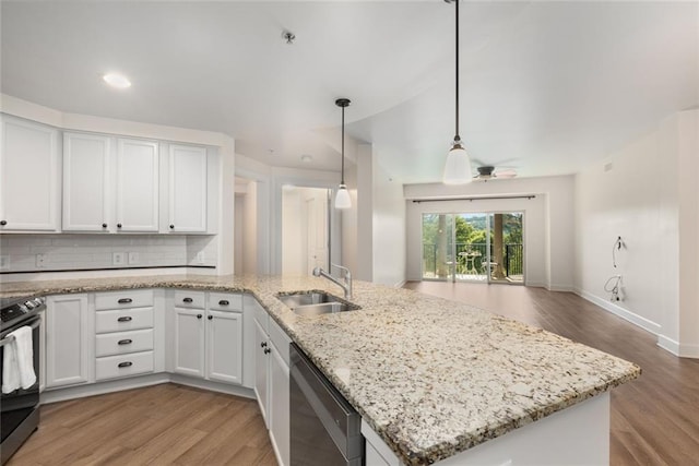 kitchen featuring stainless steel dishwasher, white cabinets, a sink, black electric range, and light wood finished floors