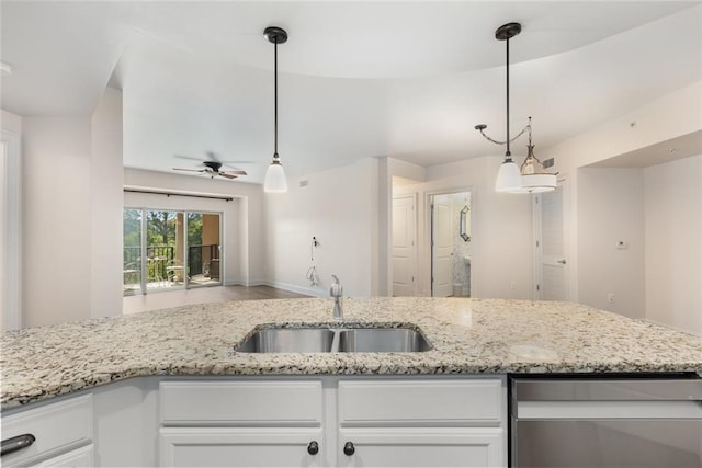 kitchen with light stone countertops, a sink, ceiling fan, white cabinetry, and dishwasher