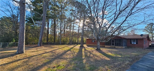 view of yard with a sunroom