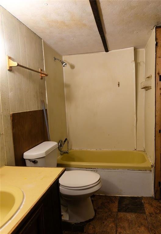 full bathroom with vanity, bathtub / shower combination, toilet, and a textured ceiling