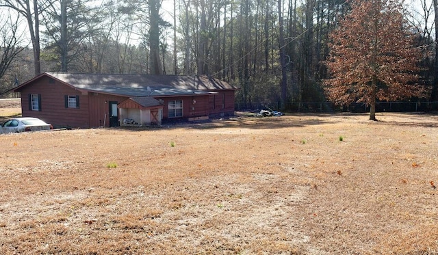 exterior space with a yard