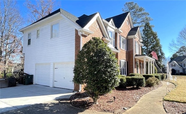 view of property exterior with a garage