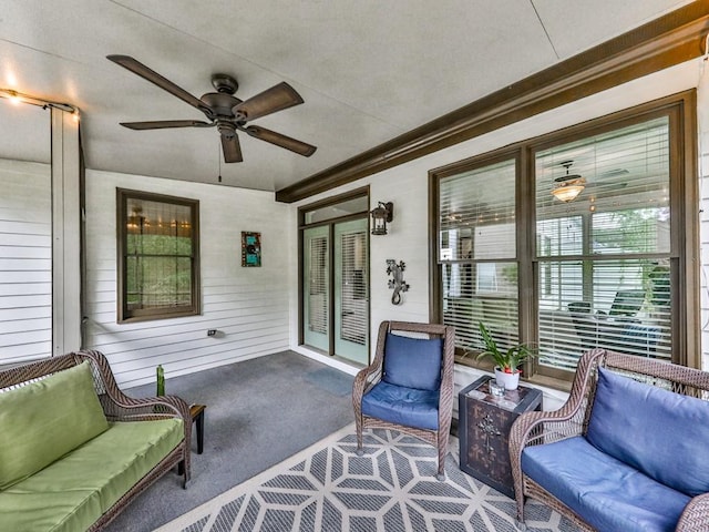 sunroom / solarium with ceiling fan