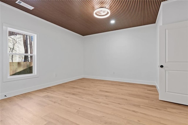 1337 Fairfield Dr, Lilburn, GA 30047 - spare room featuring crown molding and light wood-style flooring