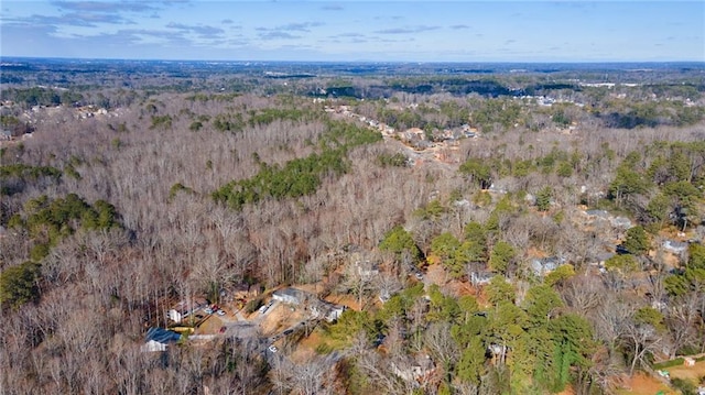 1337 Fairfield Dr, Lilburn, GA 30047 - aerial overview of property's location with a heavily wooded area