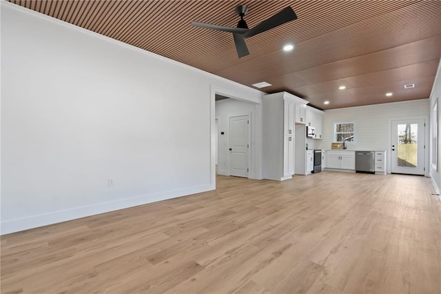 1337 Fairfield Dr, Lilburn, GA 30047 - unfurnished living room featuring ceiling fan, light wood-style floors, and recessed lighting
