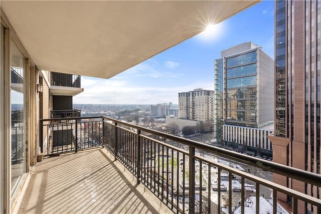 balcony featuring a city view