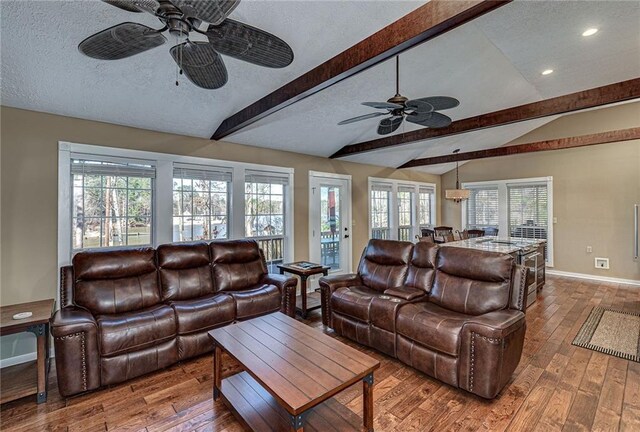 207A Quail Trl, Jackson, GA 30233 - living area with a ceiling fan, baseboards, wood finished floors, a textured ceiling, and recessed lighting