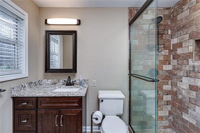 207A Quail Trl, Jackson, GA 30233 - full bath featuring a shower stall, vanity, and toilet