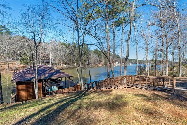 207A Quail Trl, Jackson, GA 30233 - view of yard featuring a water view and a boat dock