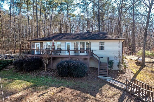 207A Quail Trl, Jackson, GA 30233 - back of property with stairway and a deck