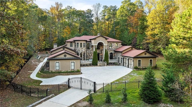 view of front of home featuring a front yard and a garage