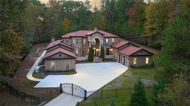 view of front facade with a front yard and a garage