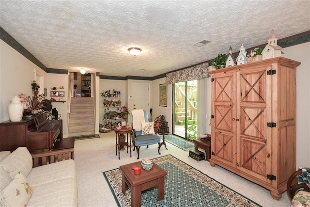 2261 Ravenwood Trl, Marietta, GA 30066 - living area featuring stairway, light colored carpet, and a textured ceiling