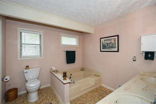2261 Ravenwood Trl, Marietta, GA 30066 - bathroom with plenty of natural light, a bath, toilet, and double vanity