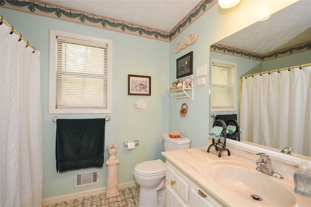2261 Ravenwood Trl, Marietta, GA 30066 - bathroom with toilet, vanity, baseboards, curtained shower, and a textured ceiling
