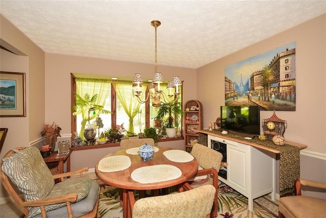 2261 Ravenwood Trl, Marietta, GA 30066 - dining room with a chandelier and a textured ceiling
