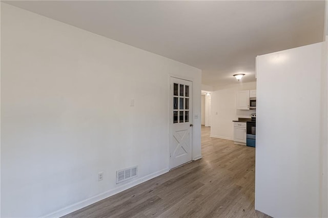 empty room featuring light wood-type flooring