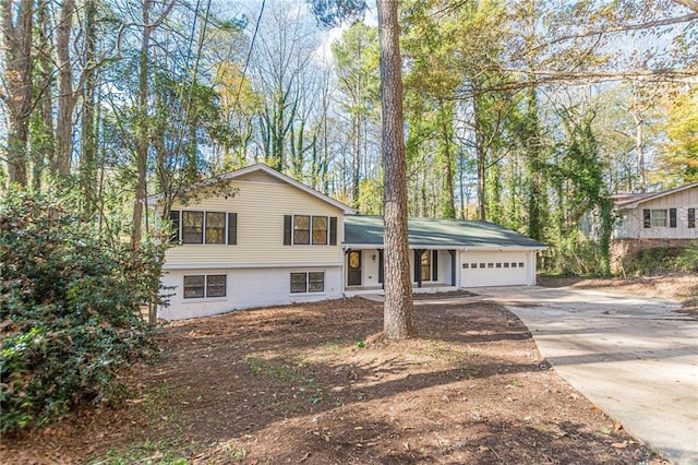 split level home with a garage