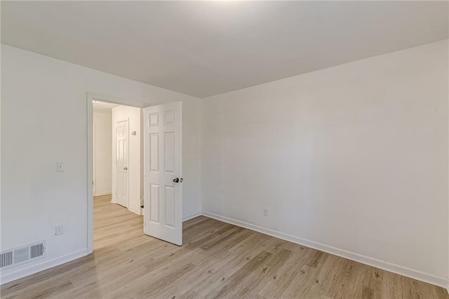 empty room featuring light hardwood / wood-style floors